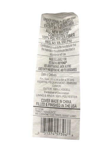 This is a care label from a Carpenter Co. Dual Layered Comfort Pillow | Extra-Firm Support, indicating it's made of 100% polyester fiber, exclusively for bed bath & beyond, and includes cleaning instructions, origin (made in China).
