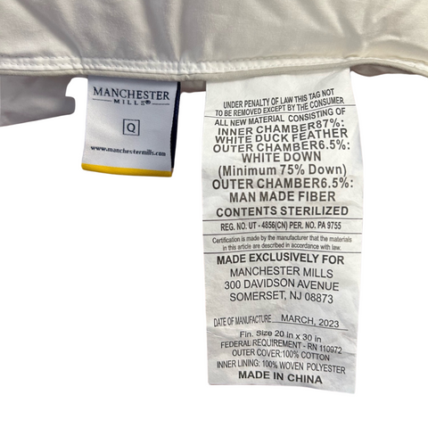 Clothing label from a Manchester Mills Temperloft ReNew Pillow Down/Down Alt Fill | Firm Support showing size and care instructions, material composition, and other mandatory details such as manufacturer location and date of manufacture. It also includes the website for Manchester Mills and states