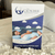A product box for "Ergonomic & Adjustable Body Pillow for Side Sleepers | The Clutcher Pillow" by The Clutcher Pillow features a woman hugging its contoured, ergonomic design. Highlights: breathable, cooling, clean foam, adjustable, hypoallergenic, partner-friendly. "Mind the Side Sleeper’s Gap.