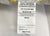 A close-up of a JS Fiber Super Gold Choice Pillow | Heavyweight tag shows black text detailing 100% siliconized fiberfill, manufacturing info, reg. no. N.C. 132, certification notice, and "MADE IN U.S.A." at the bottom for JS Fiber.
