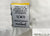 A white fabric tag reads: “Machine wash cold, gentle cycle, mild detergent. Do not bleach. Tumble dry low.” Symbols show no bleach and tumble dry. Below: “Envirosleep Dream Support Pillow by Manchester Mills. Hypoallergenic.”.