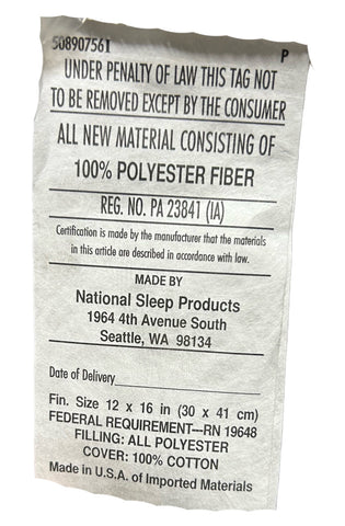 A Homespun Pillow Insert by Keeco with a label containing decorative touch.
