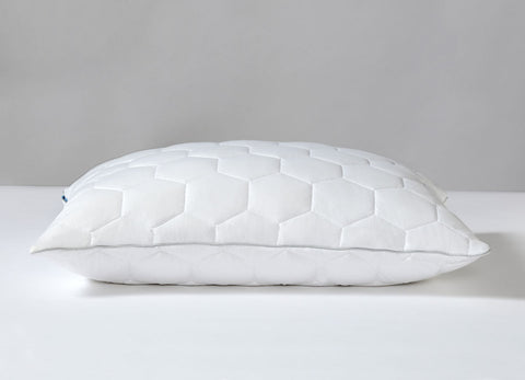 An original SHEEX 600TC Back/Stomach Sleeper Pillow on a white surface.