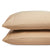 Two stacked beige pillows with a smooth texture against a white background, portraying a minimalist and comfortable bedding accessory, featuring the Delilah Home Organic Cotton Sheet Set with 300 thread count sheets.