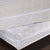 Two white Permafresh Bed Protector Sets | Antimicrobial sit atop a wooden bed.