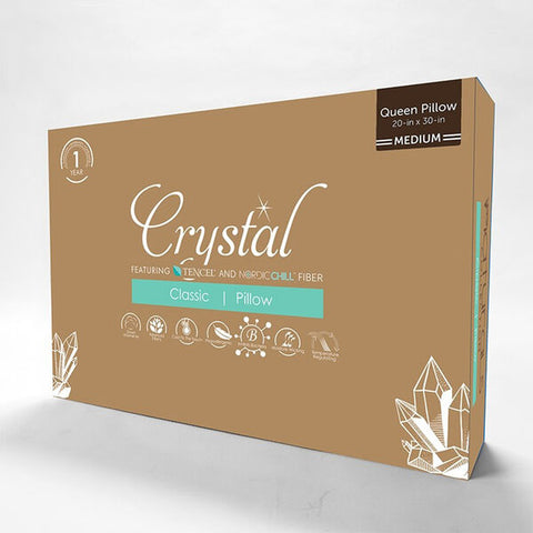 A box with the word Protect-A-Bed Crystal Tencel Cooling Pillow on it containing a Memory Foam pillow.