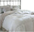 A bed with a white Restful Nights Ultima Supreme comforter and pillows.