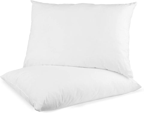 A set of two plush white pillows with a soft, hypoallergenic JS Fiber Dacron II Quallofil | Extra Plump filling, encased in a smooth, breathable cotton cover, suitable for a comfortable sleep.