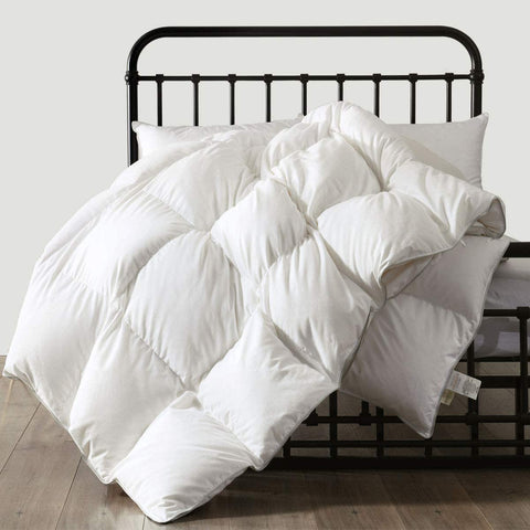A luxurious Pillow Factory 100% White Duck Down Duvet Insert is placed on the bed.