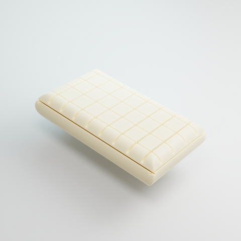 A Blu Sleep Prestige Coconut Memory Foam Pillow on a surface.