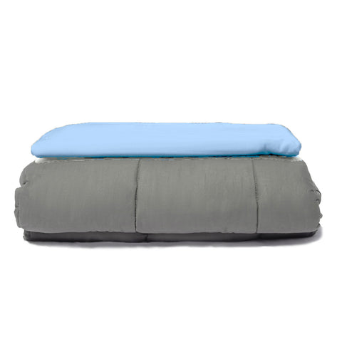 A grey and blue Pillowtex Bamboo Duvet Cover for Weighted Blanket with a cover.