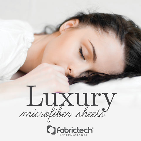 A woman peacefully sleeping on PureCare Luxury Microfiber Sheet Set, which are wrinkle resistant and machine washable.