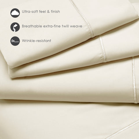 A set of beige PureCare Luxury Microfiber sheets that are machine washable.