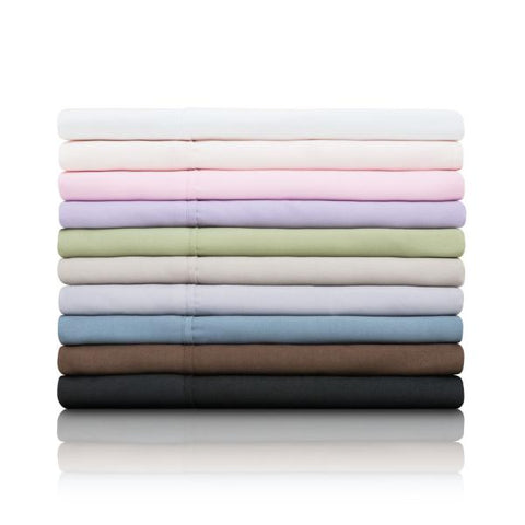 A stack of Malouf Brushed Microfiber Sheet Sets on a white background.