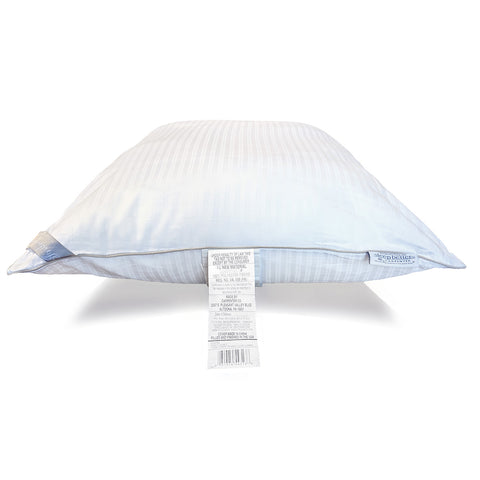 A fluffy, light blue striped Indulgence® Synthetic Down Pillow with a prominent white Carpenter care label hanging from its side, set against a pure white background.