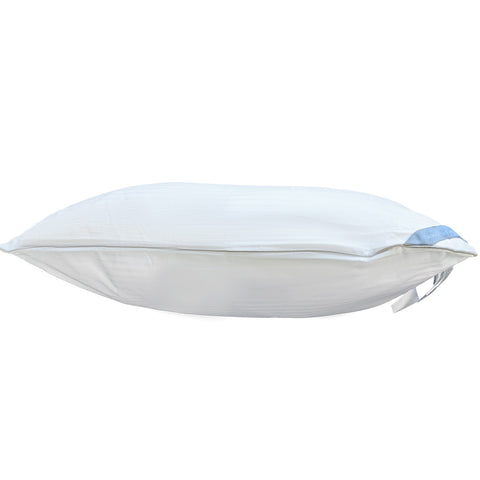 A side view of a Carpenter Indulgence® Synthetic Down Pillow with a white, hypoallergenic, machine-washable pillowcase and a visible blue and white label on the side, isolated on a white background.