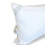 Two Indulgence® Synthetic Down Pillows by Carpenter with delicate silver embroidery along the edges, stacked partially on top of each other, against a white background. Care instruction labels are visible on the side.