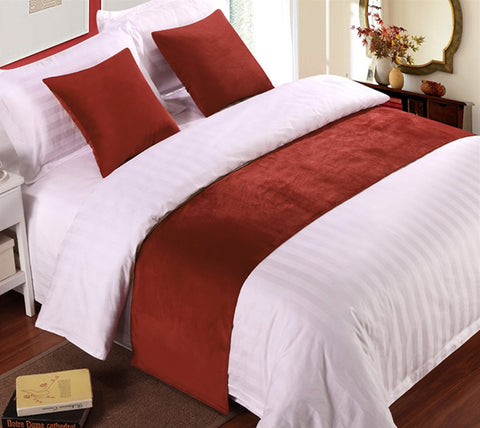 A bed with a red and white comforter and Pillowtex Final Sale: Pillowtex Faux Suede Bed Scarf.