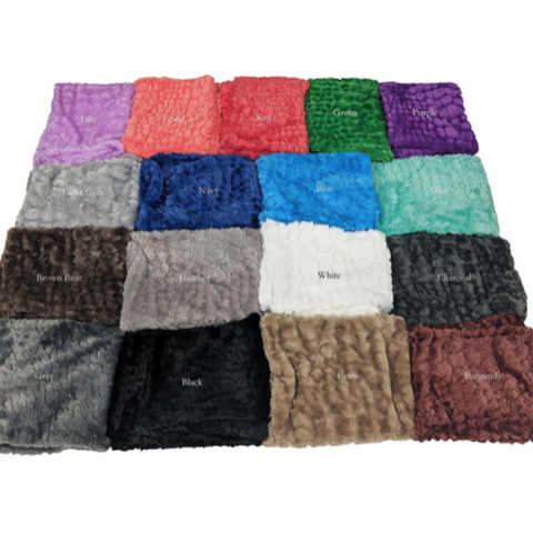 A variety of Pillowtex Body Pillow Covers in colorful plush faux fur.