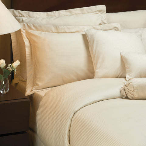 1888 Mills Linen Flat Sheet | 300TC white comforter on a bed.