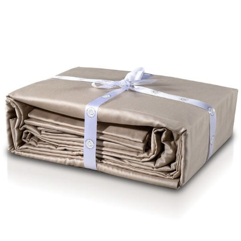 A neatly folded set of soft taupe, 300-count Delilah Home Organic Cotton Duvet Cover sheets tied with a light blue ribbon, presented on a white background, ready to be gifted.