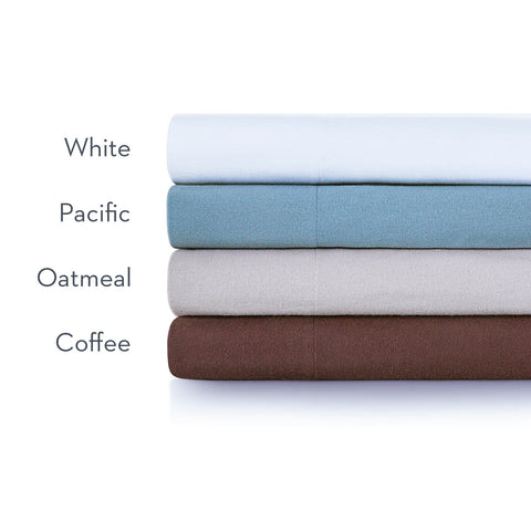 A stack of Malouf Portuguese Flannel Pillowcase Sets with a pacific design.