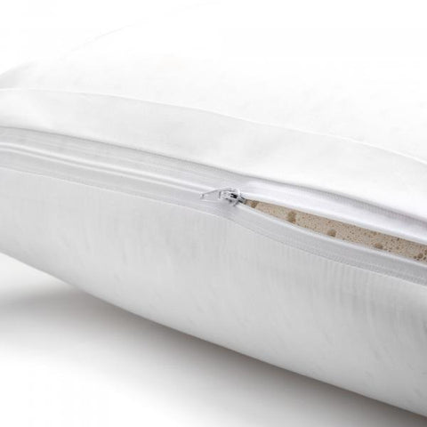 A white Malouf pillow with a zipper, made of Malouf Zoned Natural Talalay™ latex for zoned comfort.