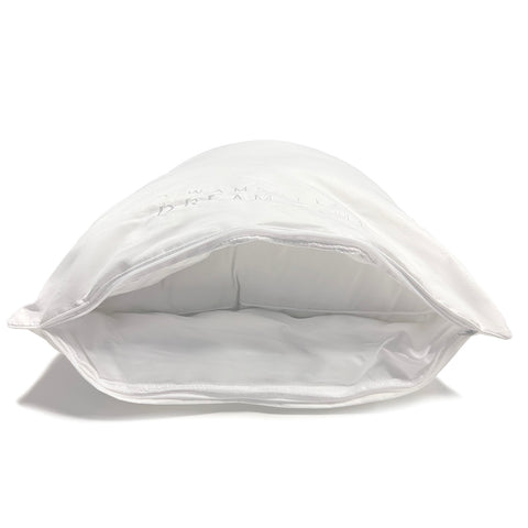 A supportive Wamsutta Dream Zone Synthetic Down Pillow from Carpenter on a white surface.
