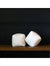 Two Down Etc. Decorative Pillow Insert | Cubes on a wooden bench in front of a black wall.