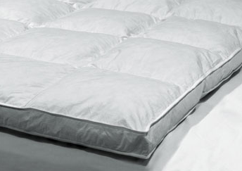 A Down Etc. Double Layer Baffle Box Featherbed with a white pillow for comfort and support.