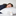 A woman sleeping on a Hollander Support Pillow with a Holiday Inn® Soft and Firm Polyester Pillow Combo Pack label.