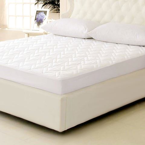 Down Etc. Lily-Pad Waterproof Mattress Pad has a 100% cotton twill face, 100% waterproof polyester backing
