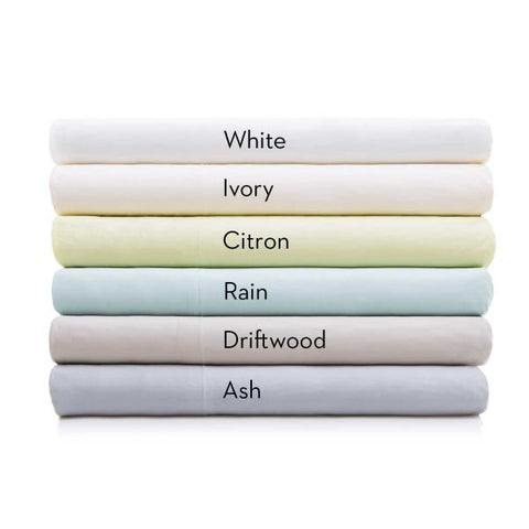 A stack of Malouf Bamboo Pillowcase Sets in different colors.