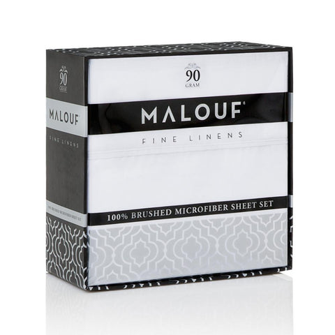 Luxuriously soft Malouf Brushed Microfiber Sheet Set in a box with deep pockets for a perfect fit.