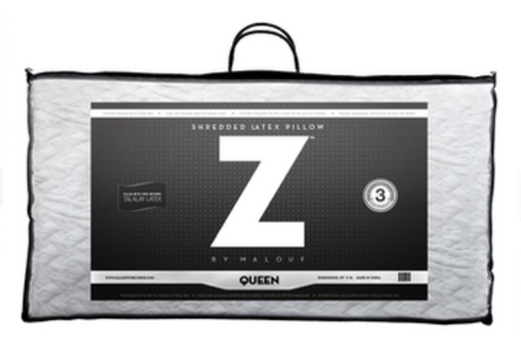 A black hypoallergenic Malouf Duo Latex Pillow with the letter Z on it.