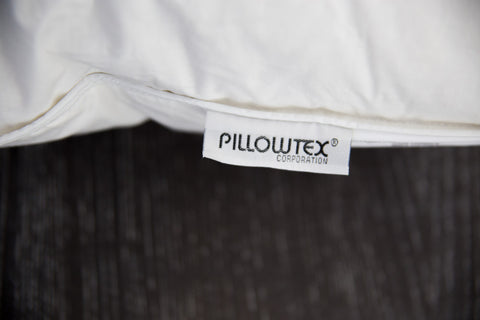 A close up of a Pillowtex White Duck Down & Feather Pillow for comfort during sleep.