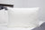 A hypoallergenic white Pillowtex Allerban Polyester Pillow on a bed.