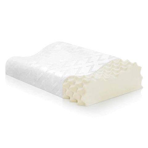 A Malouf Convoluted Contour Latex pillow on a background.