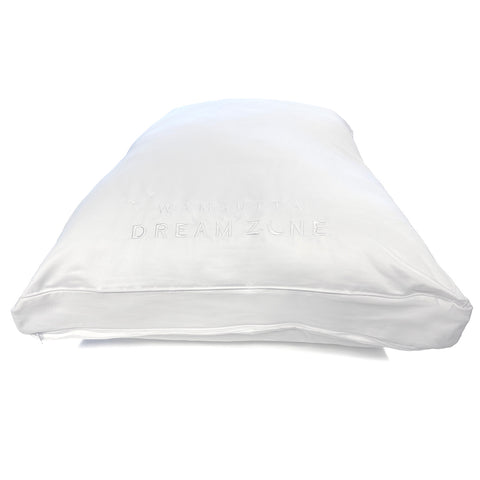 A white, fluffy Carpenter Wamsutta Dream Zone Synthetic Down Side Sleeper Pillow on a pure white background, showcasing a subtle logo embossed on the 750 thread count cotton pillowcase fabric for a touch of elegance.
