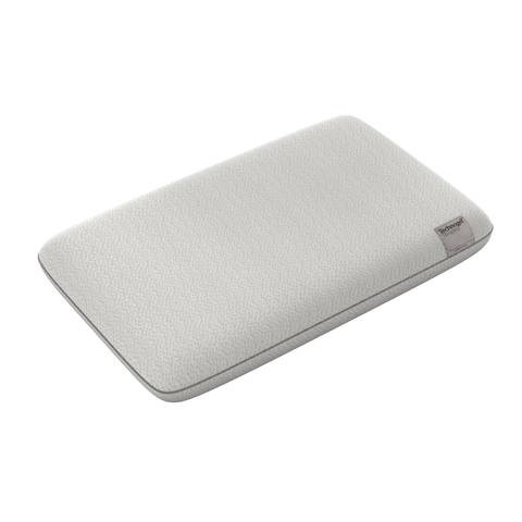A Technogel Deluxe Thin Pillow for restful sleep on a white surface.