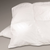 A Manchester Mills white pillow on a grey background, perfect for SEOKeywords.