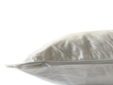 A white body pillow with a zipper on its Pillowtex Body Pillow Cover.